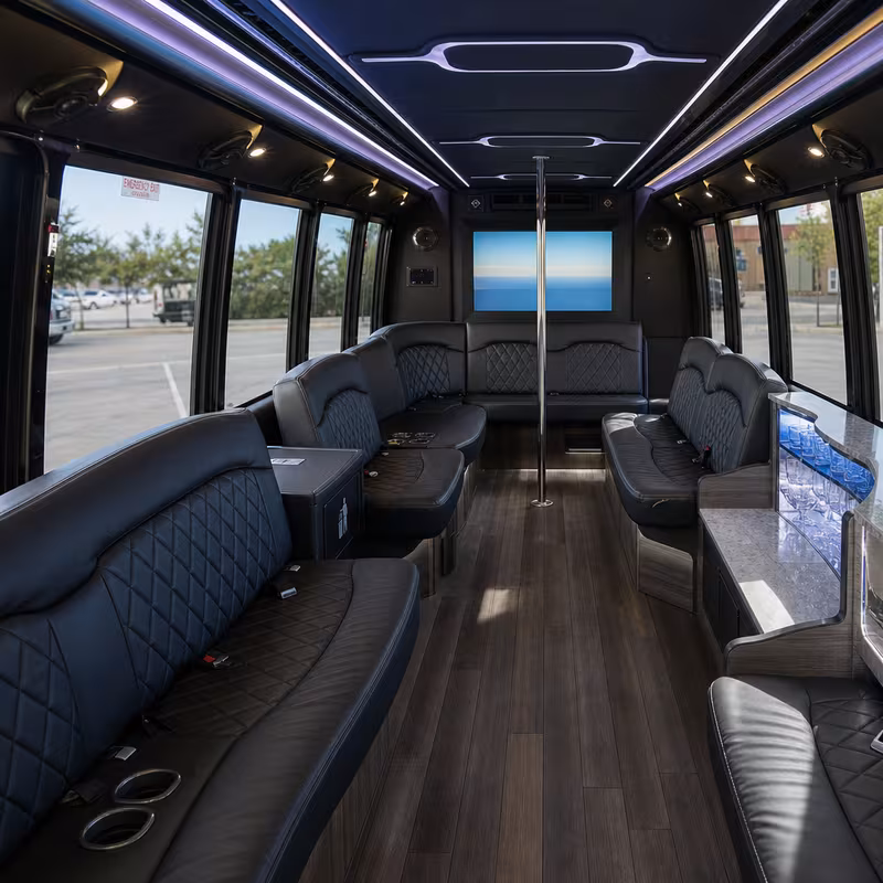 Passenger watching the Des Moines scenery during a regional party bus road trip