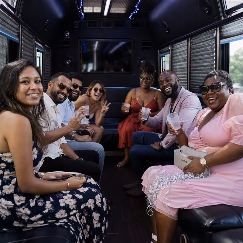 Black Mercedes Sprinter van staged for an Des Moines Birthday Transportation group