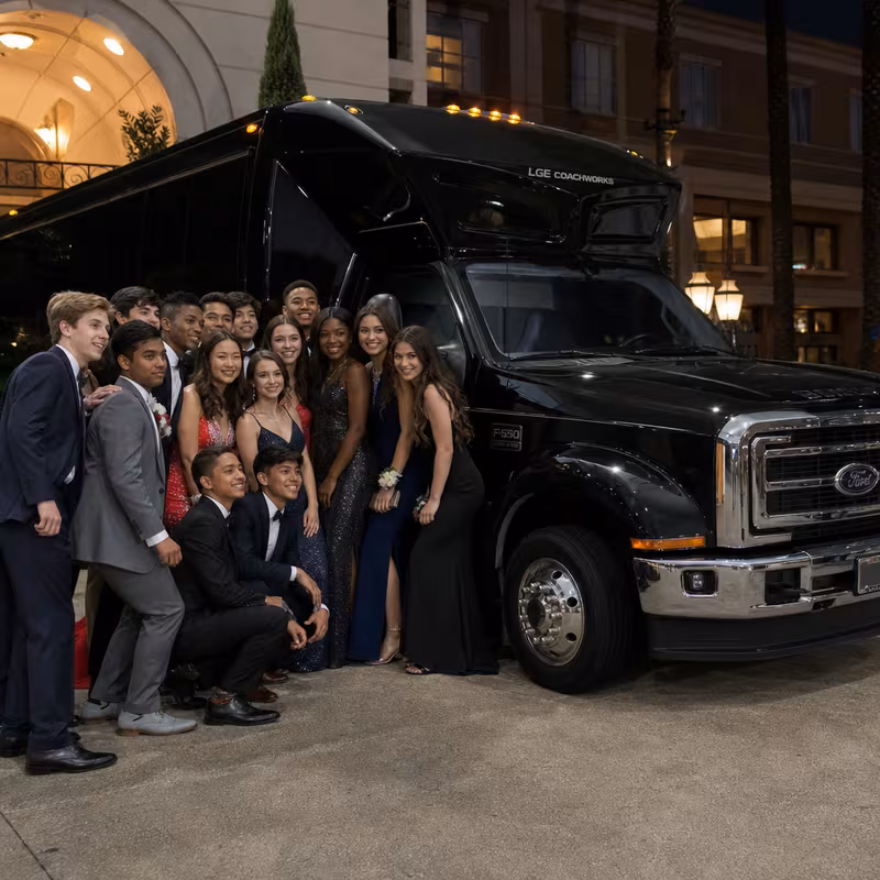 Party bus interior with wraparound leather seating and LED lighting in Des Moines