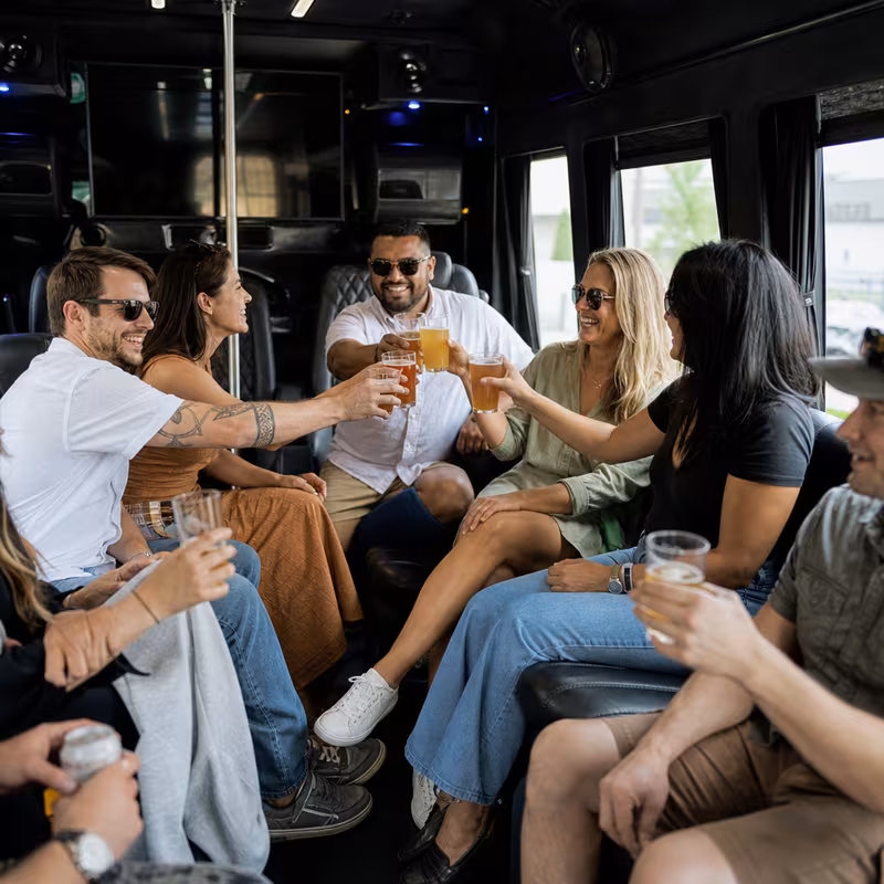 Black Mercedes Sprinter van staged for an Des Moines Winery & Brewery Tour Transportation group